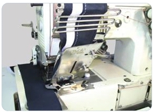 Приспособление UMA-117-K с регулированием для подгибки и пришивания корсажа и бейки к поясу брюк