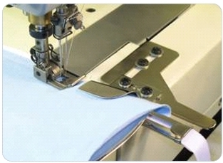 Приспособление UMA-84 для подачи с натяжением резины и подгибом ткани в чистый край