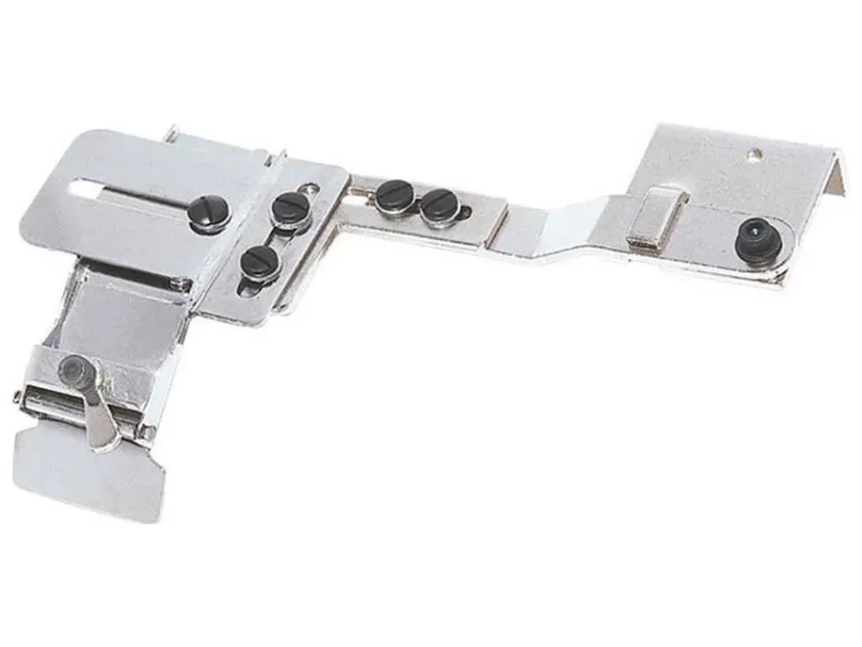 Приспособление E129 для подачи тесьмы, Surucu